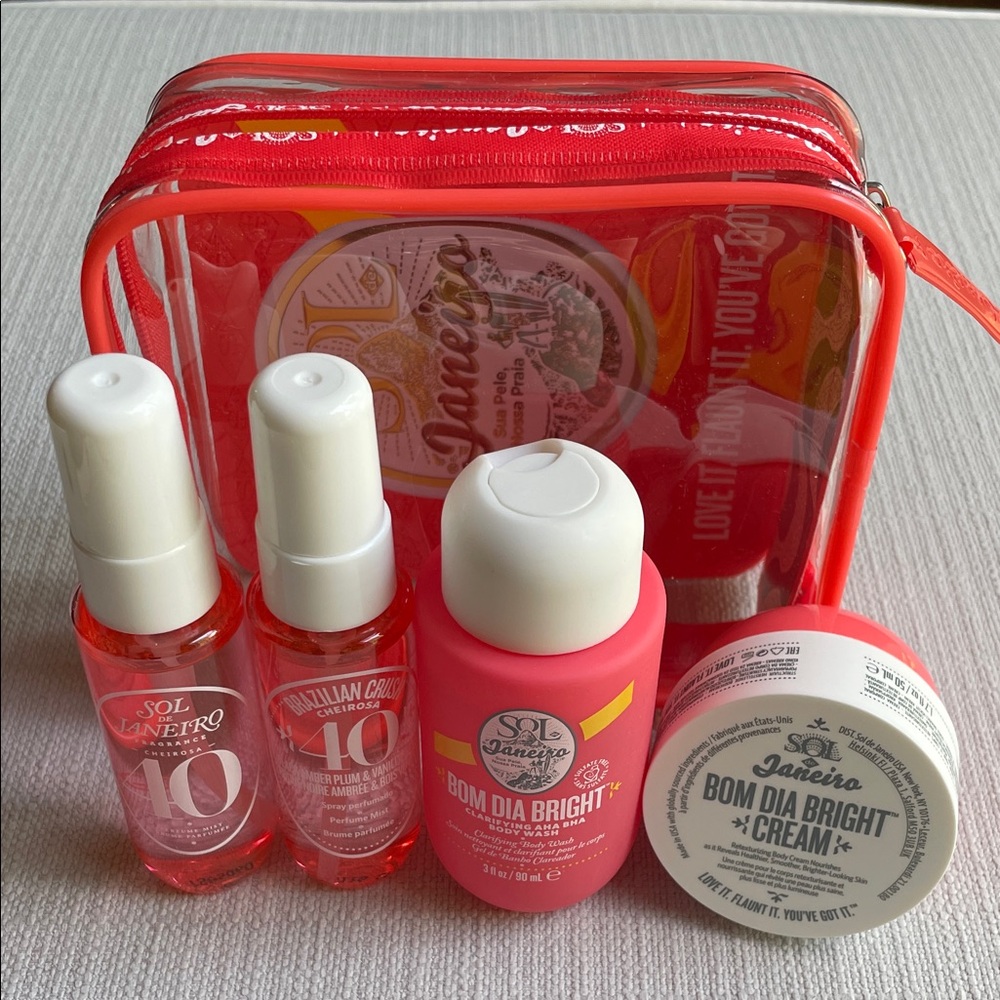 Sol de Janeiro bom dia bright travel body care set with clear pink pouch